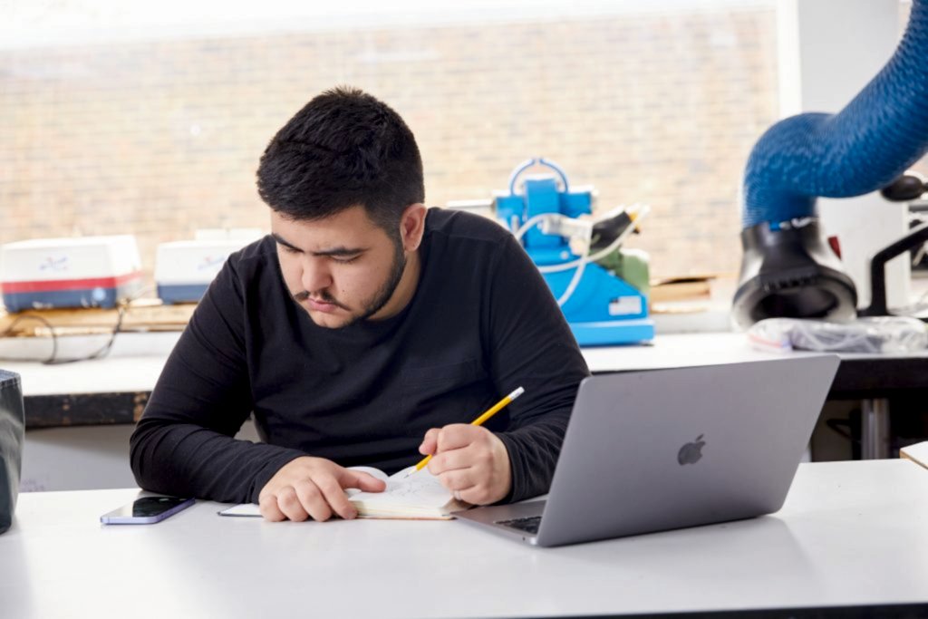 Student working on their laptop